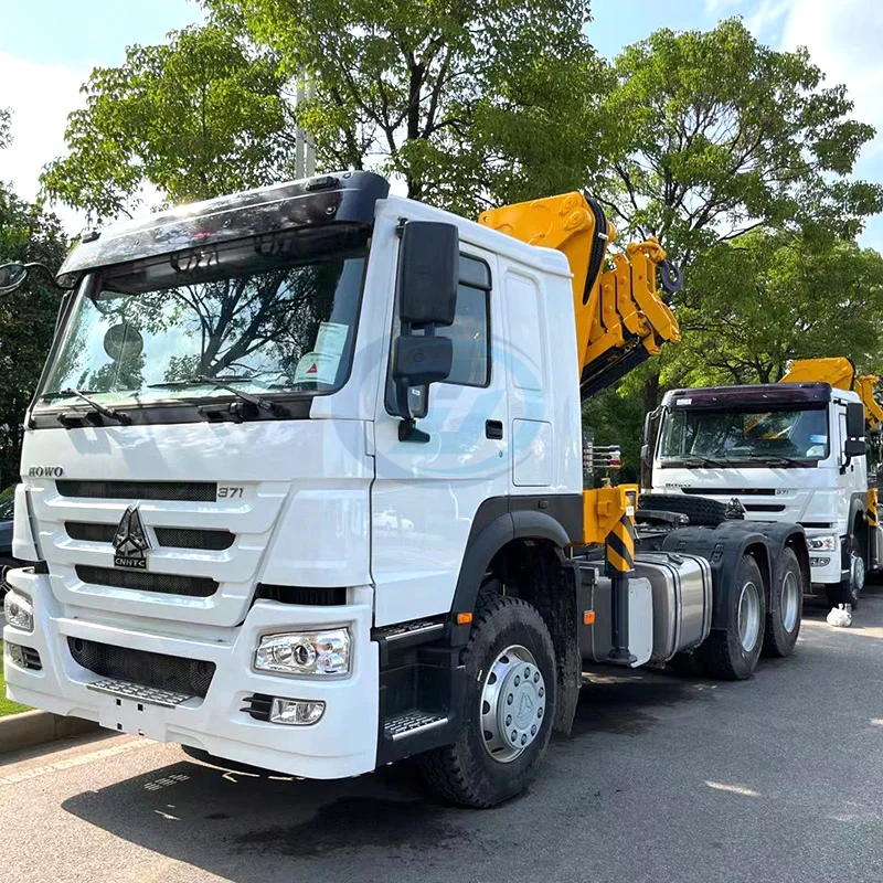 Camión tractor SINOTRUK HOWO 6X4 con grúa