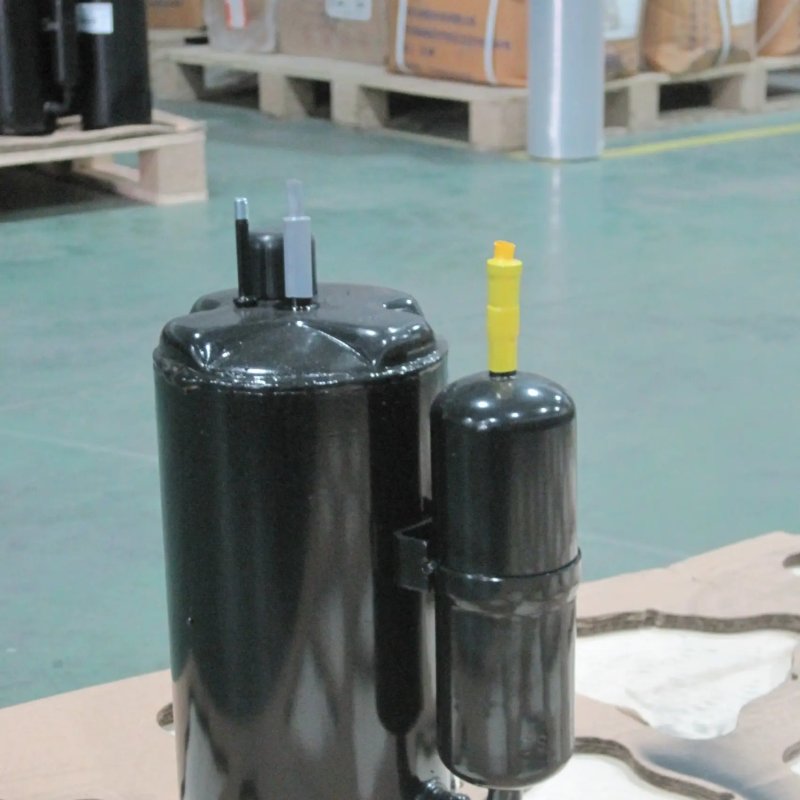 Enclosed motor heat pump compressor for cooling and heating