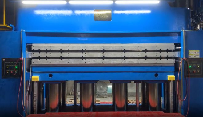 Video of large column precision plate heat exchanger gasket equipment and building seismic isolation bearing vulcanizing machine