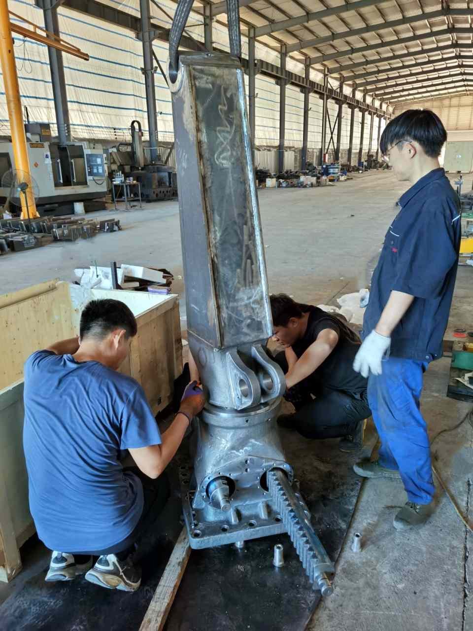 SMEMACH technician performing trial assembly in foundry with integrated testing capabilities – quality guaranteed