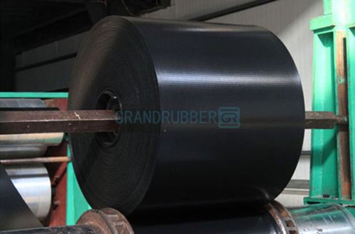 Banda transportadora de tejido sólido