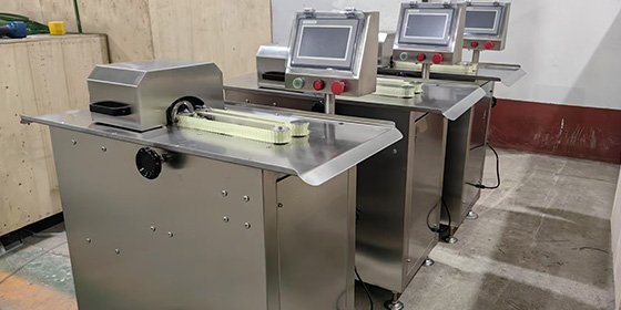 The production of three fully automatic Sausage Tying Machines that were reordered by Vietnamese customers has been completed.