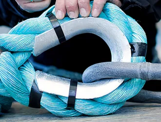 HDG Rope K3 Thimble with Master Link installed with blue fiber rope for aquaculture mooring