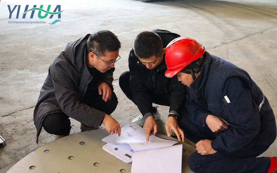 What production issues do engineers, workshop supervisors, and production managers discuss when manufacturing sedimentation tanks?