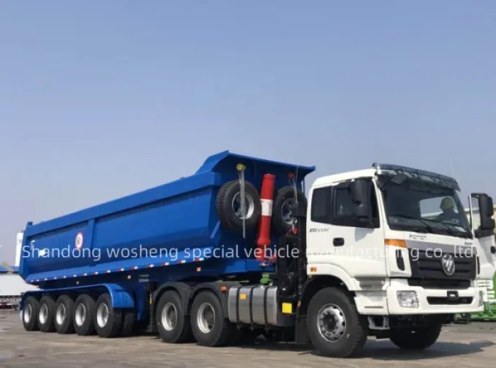 Self-dump semi-trailer