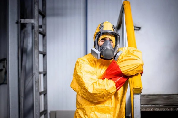 Factory workers wear protective clothing to work