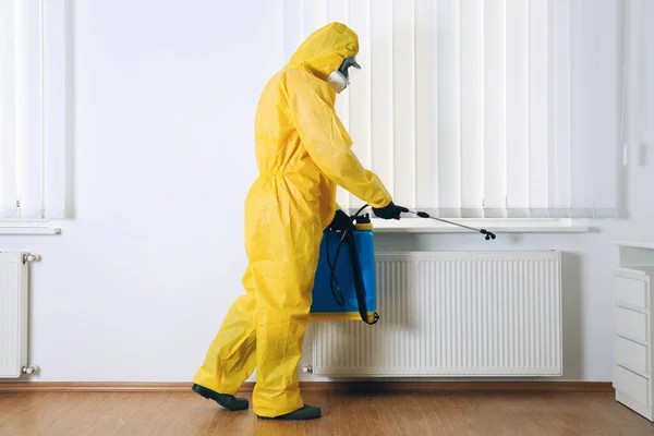 Cleaners wear protective clothing to work