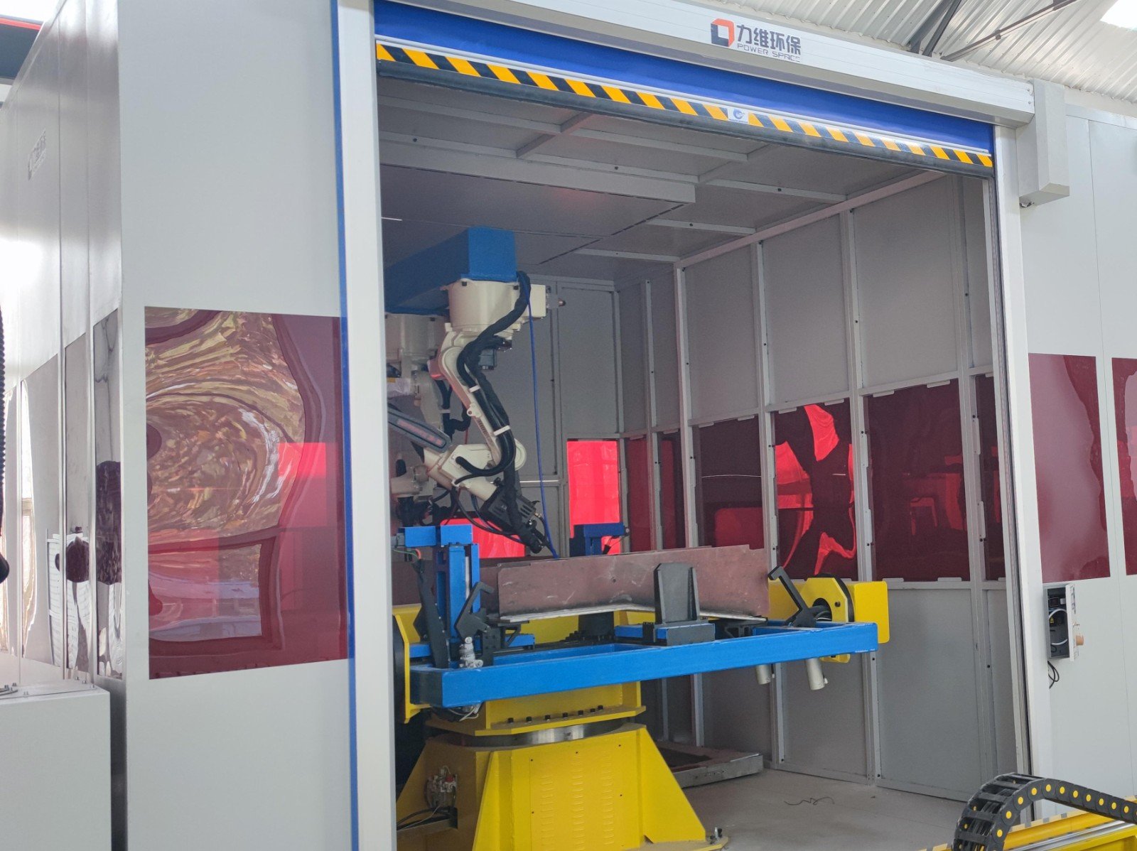 Welding Robot in Closed Welding Cell